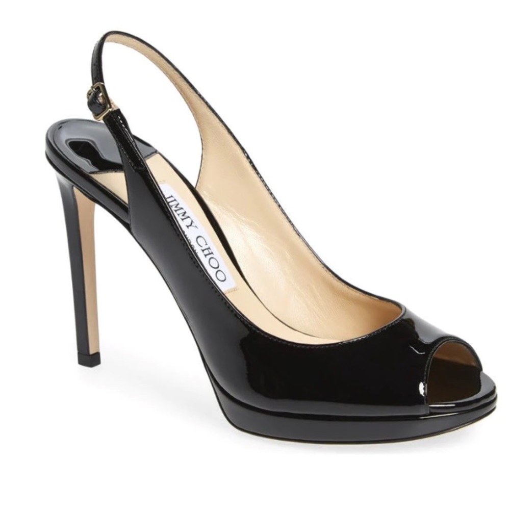 Jimmy Choo Patent Leather Slingback Pumps
Peep-Toes
Buckle Closure at Ankles